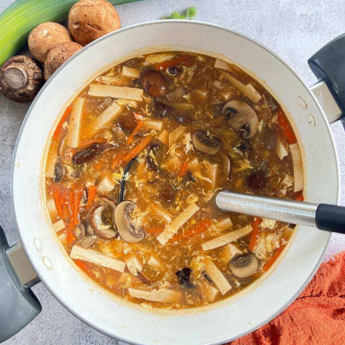 A large pot of hot and sour soup.