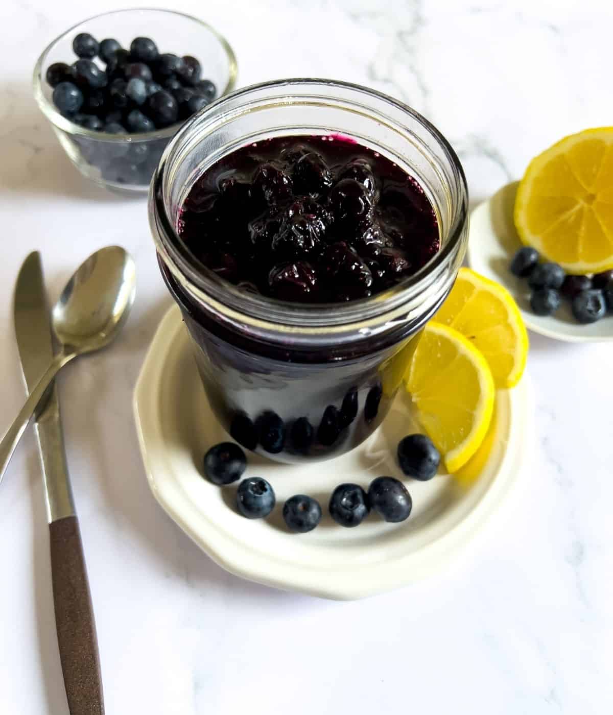 Blueberry jam on the table.