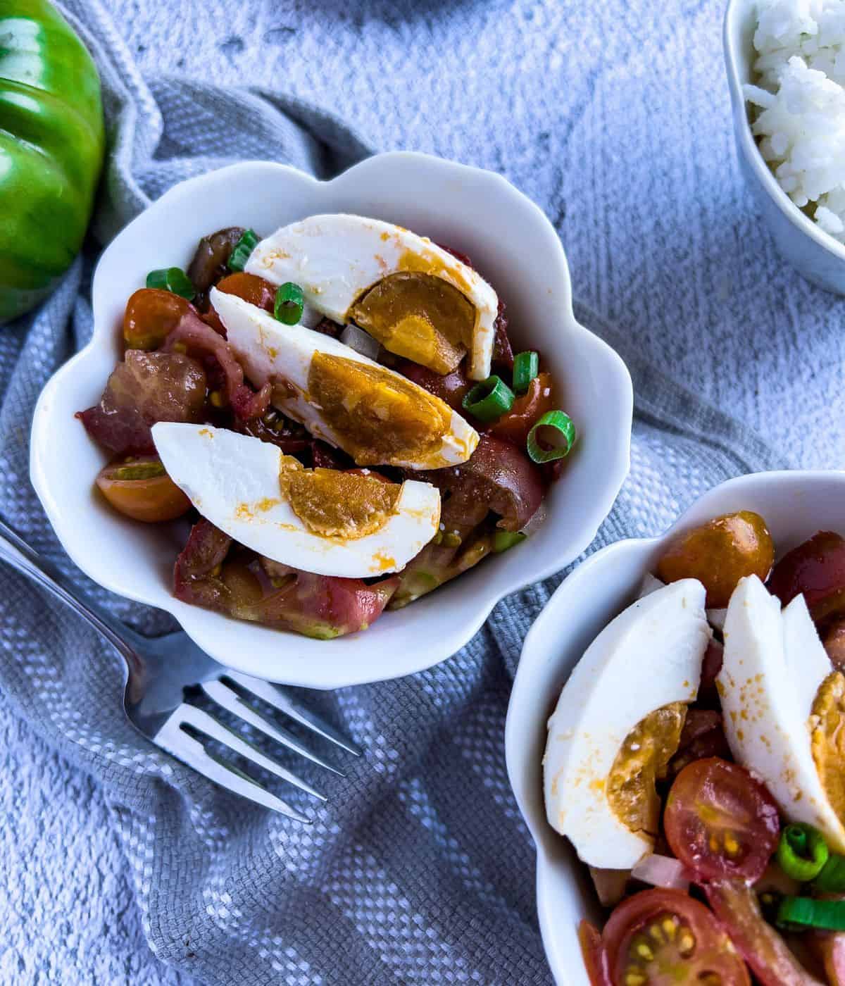 Salted duck egg salad in two small bowls.