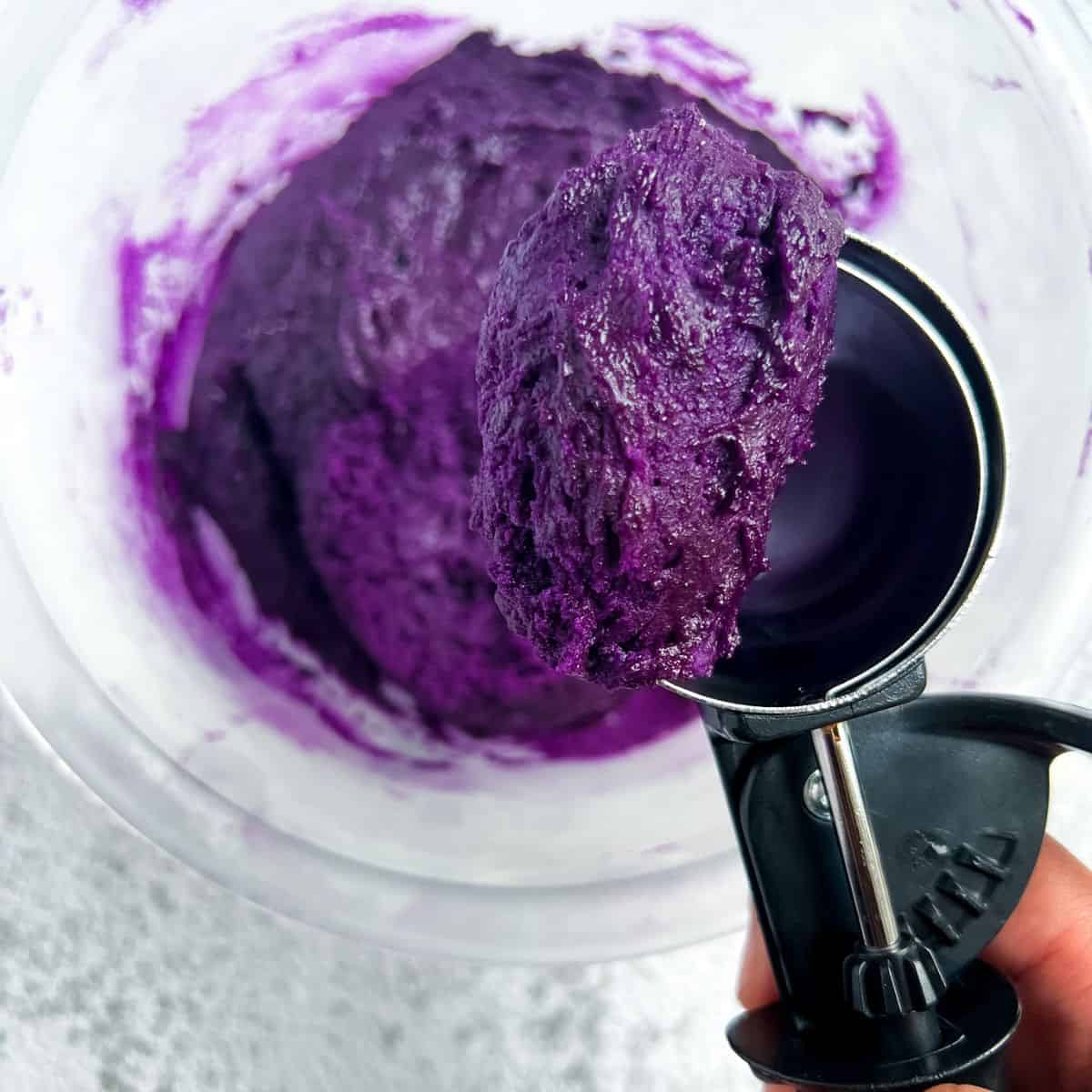 Cookie dough in an ice cream scoop.