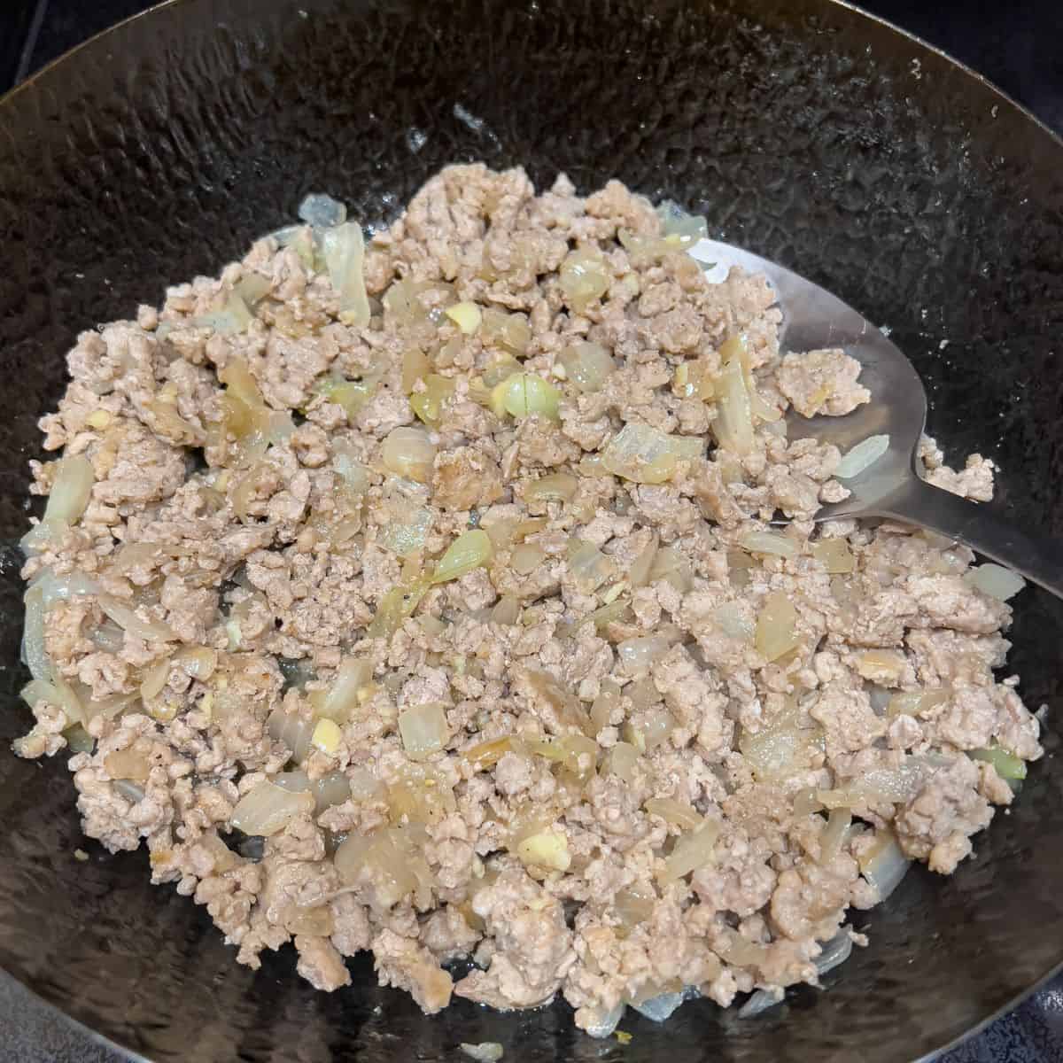 Sauteed onion and garlic with ground pork.