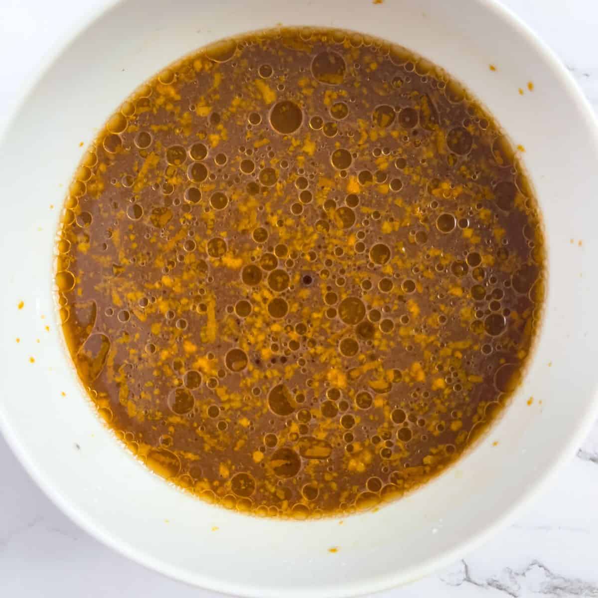 Orange chicken tofu sauce in a bowl.