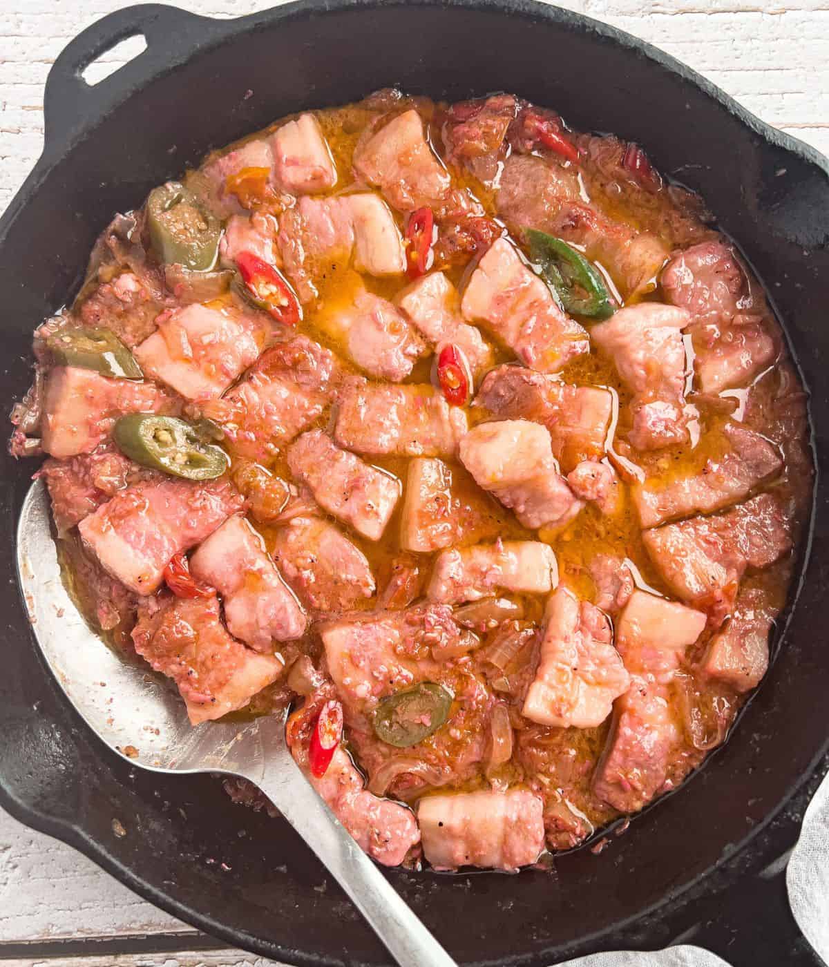 Finish dish of pork binagoongan in a skillet.