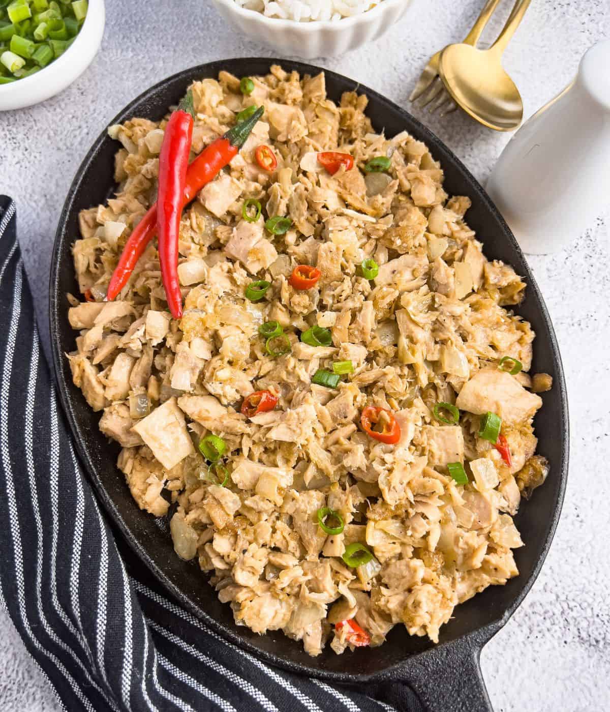 Finish dish in sizzling platter.