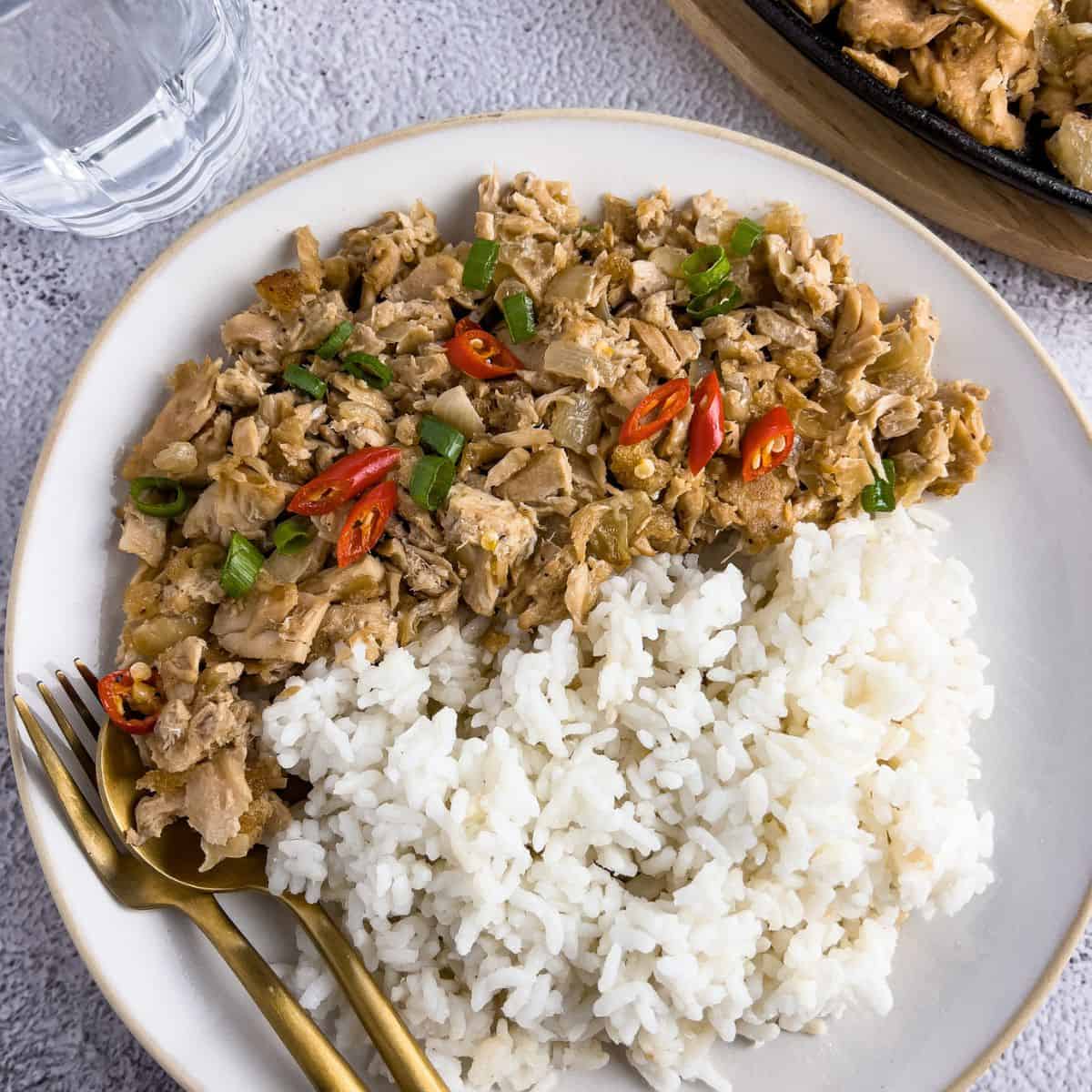 Finish dish of tuna sisig in a plate.
