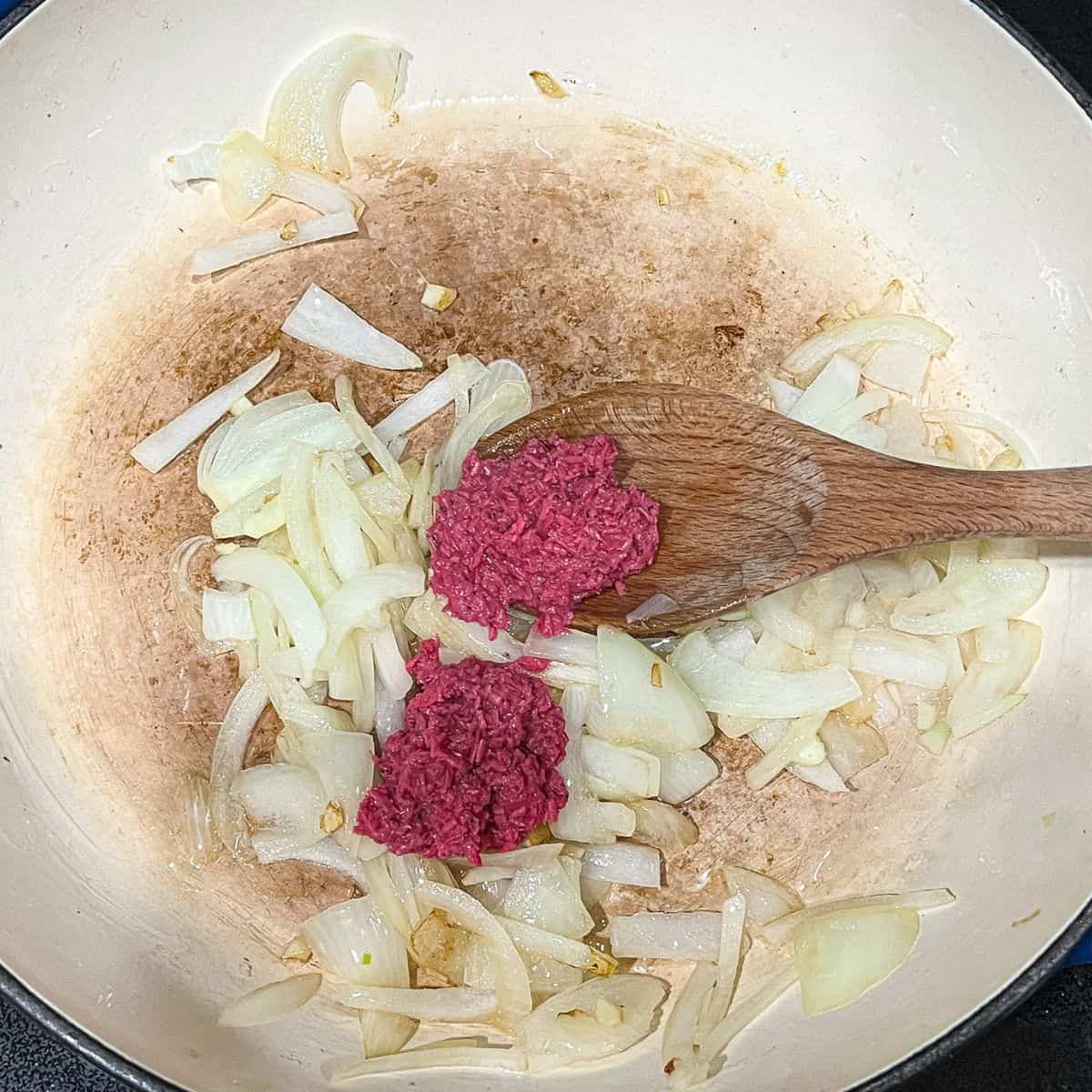 Saute onion, garlic, and shrimp paste.