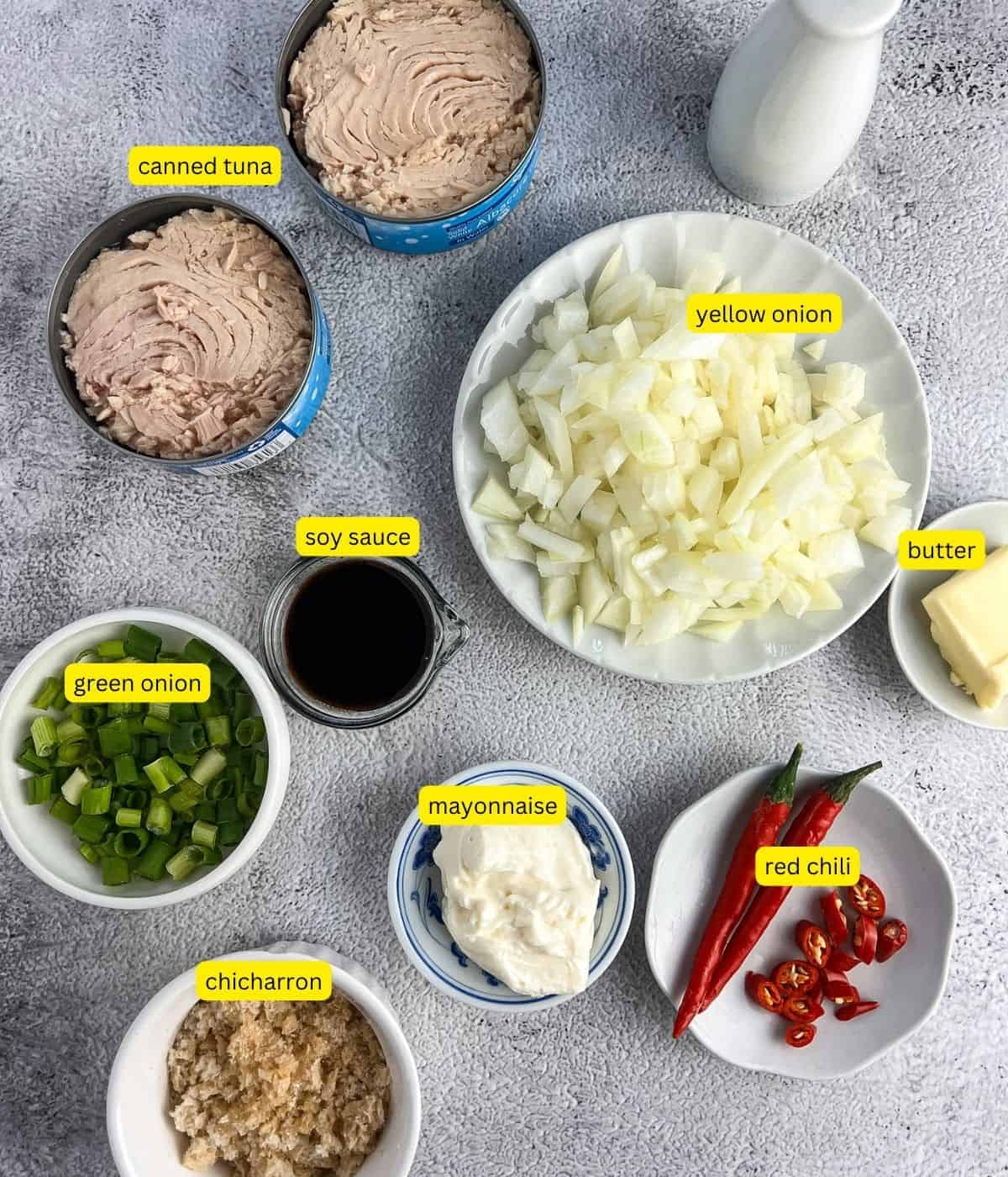 Ingredients for tuna sisig on the table.