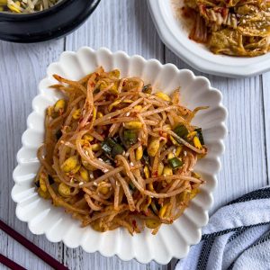 Finish dish of kungnamul muchim in a small plate.