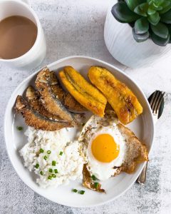 Filipino's favorite breakfast, tuyo, fried banana, fried, egg, and rice.