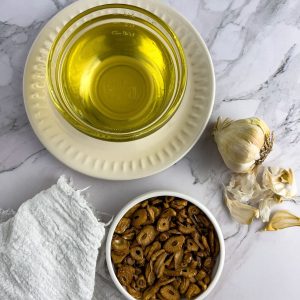 Fried garlic and garlic oil on the table.